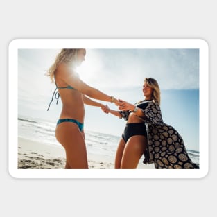 Two Young Pretty Girls Having Fun Together on Sunny Beach Sticker